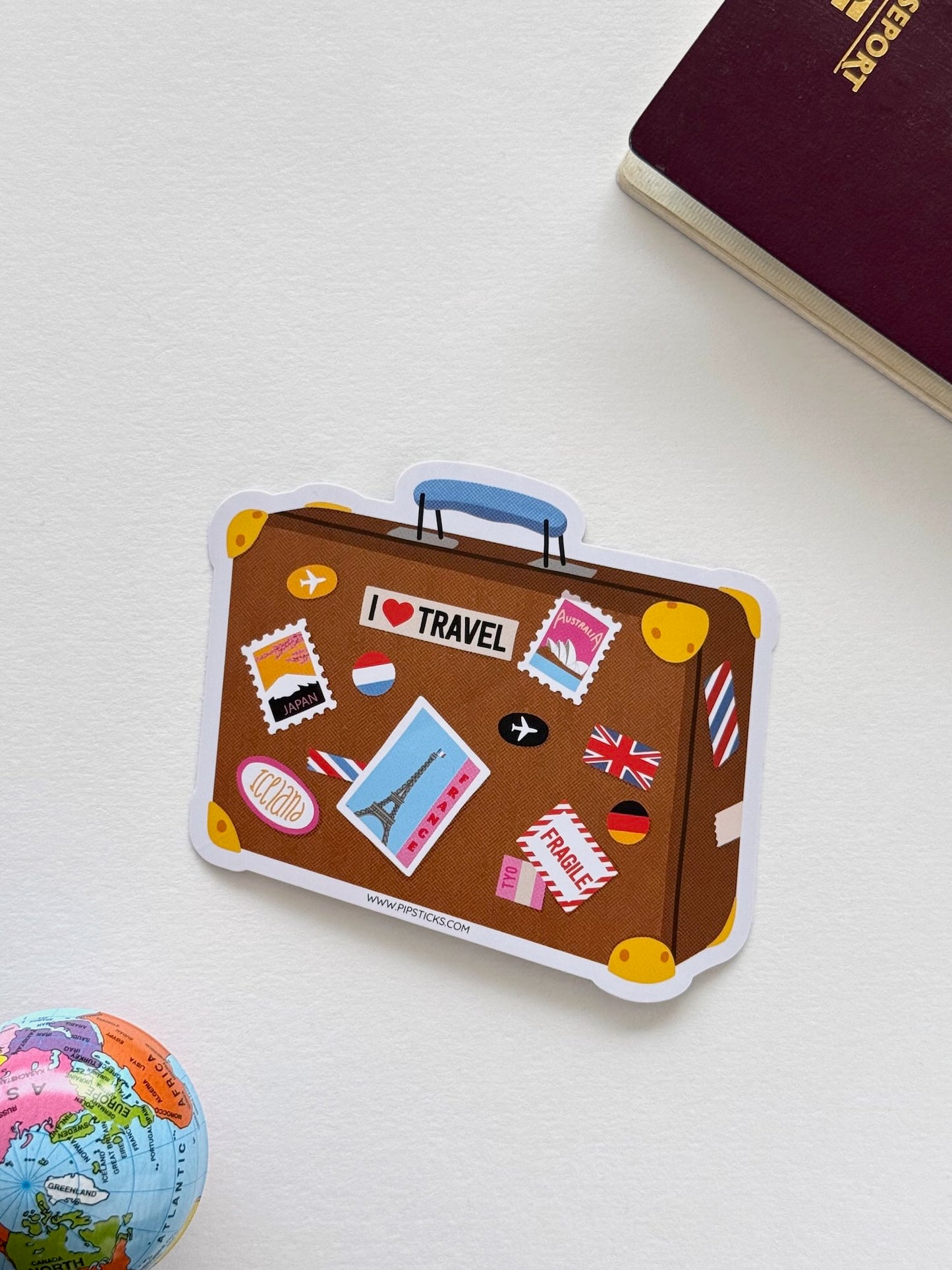 Sticker | Valise de voyage et ses souvenirs d’escales