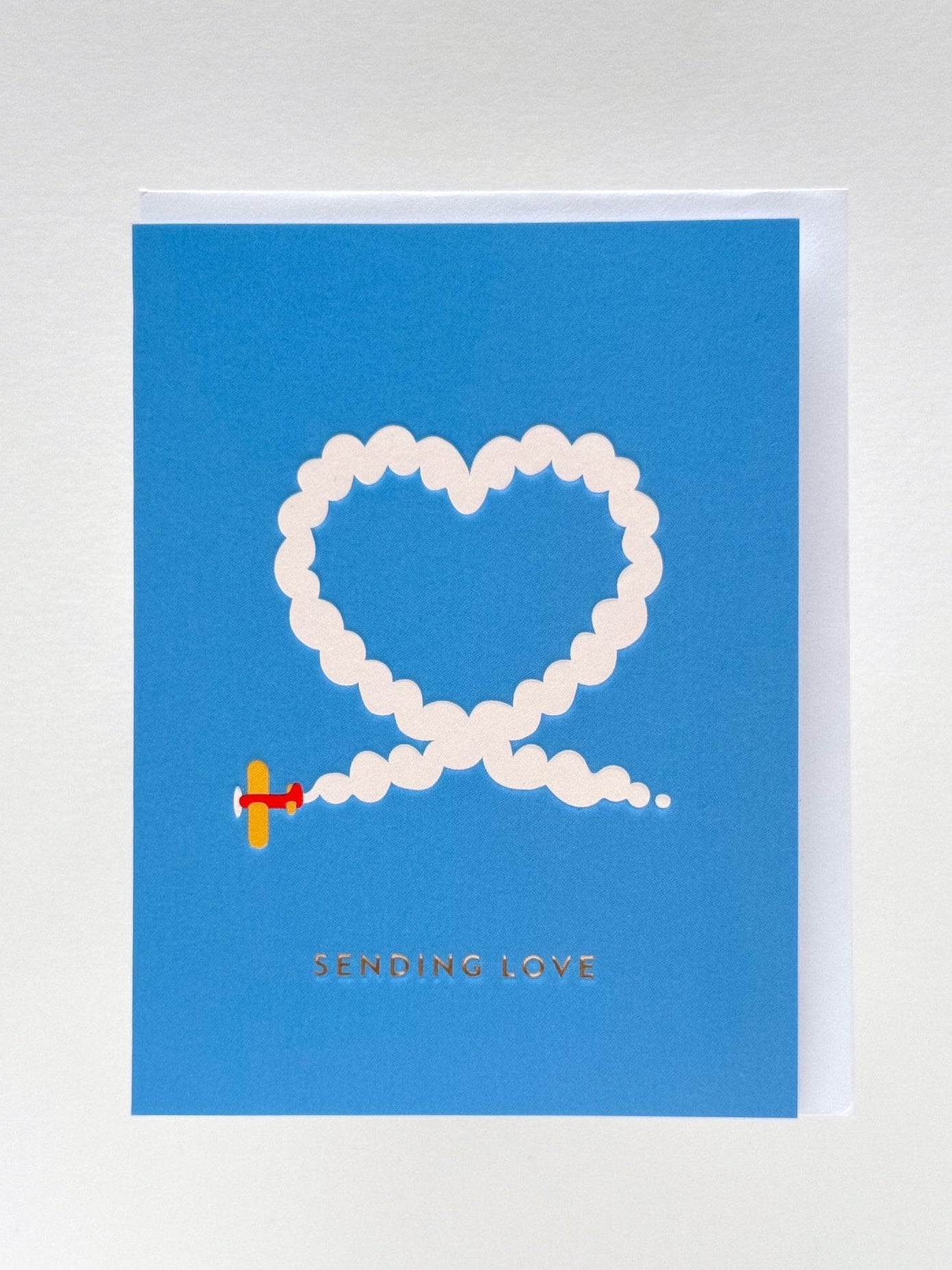 Carte | Avion dessinant un cœur