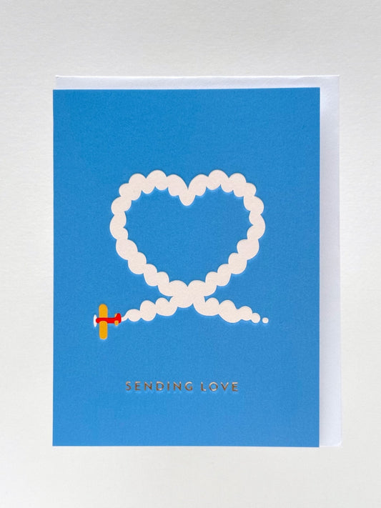 Carte | Avion dessinant un cœur